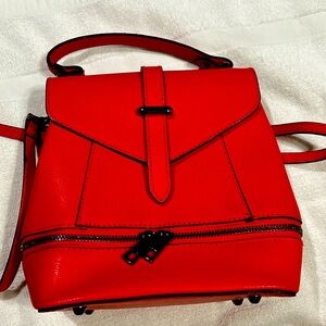 Red genuine leather handbag.